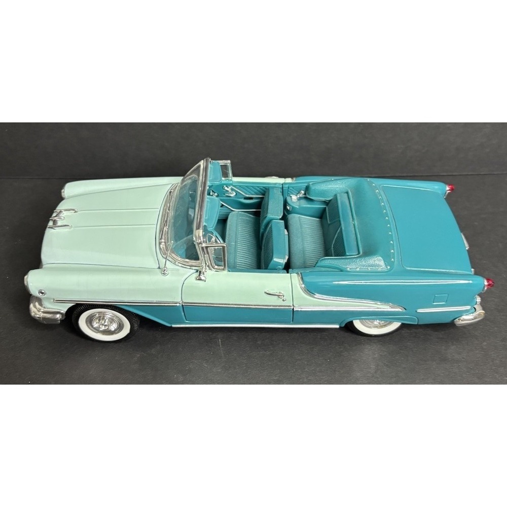 Welly 1955 Oldsmobile Super 88 Convertible Diecast Mint Teal 1:24 No Box
